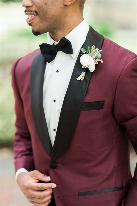 maroon suit with bow tie.